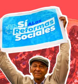 persona sosteniendo pancarta de la reforma laboral